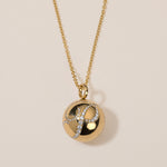 halo ball locket necklace in 18k gold with diamond engraving
