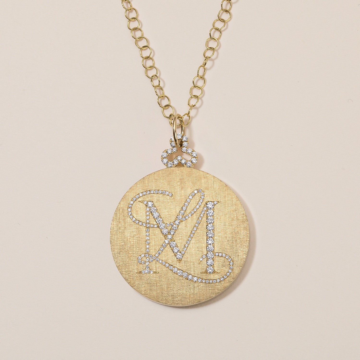 18k gold locket necklace with diamond monogram engraving