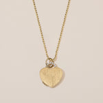 18k gold heart locket necklace with diamond arch