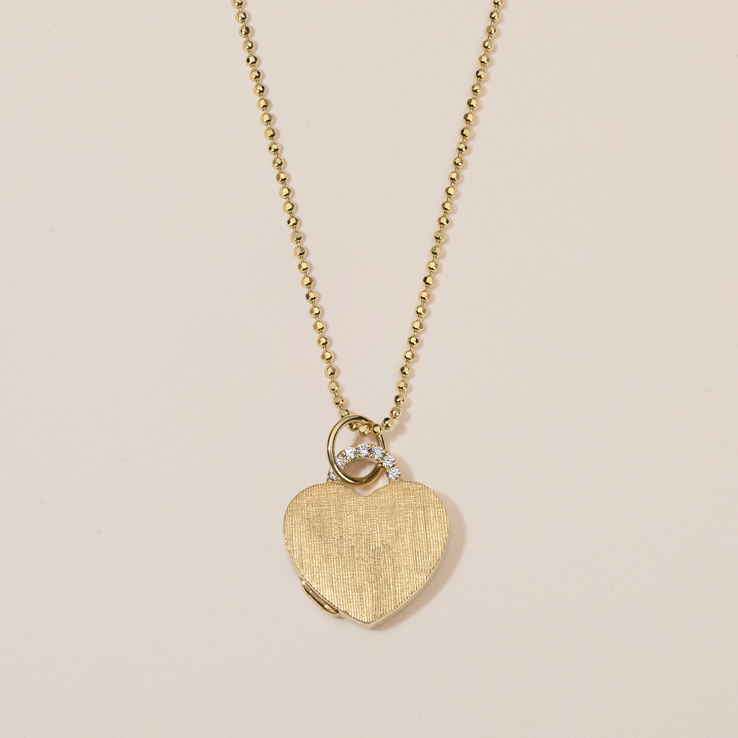 18k gold heart locket necklace with diamond arch