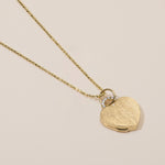 18k gold heart locket necklace with diamond arch