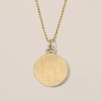 18k gold locket necklace with diamond trefoil