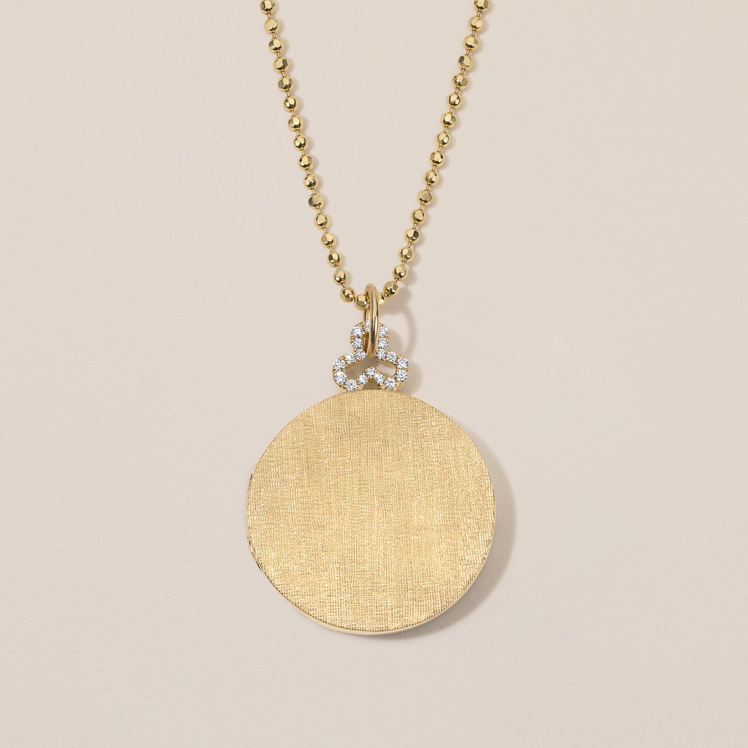 18k gold locket necklace with diamond trefoil