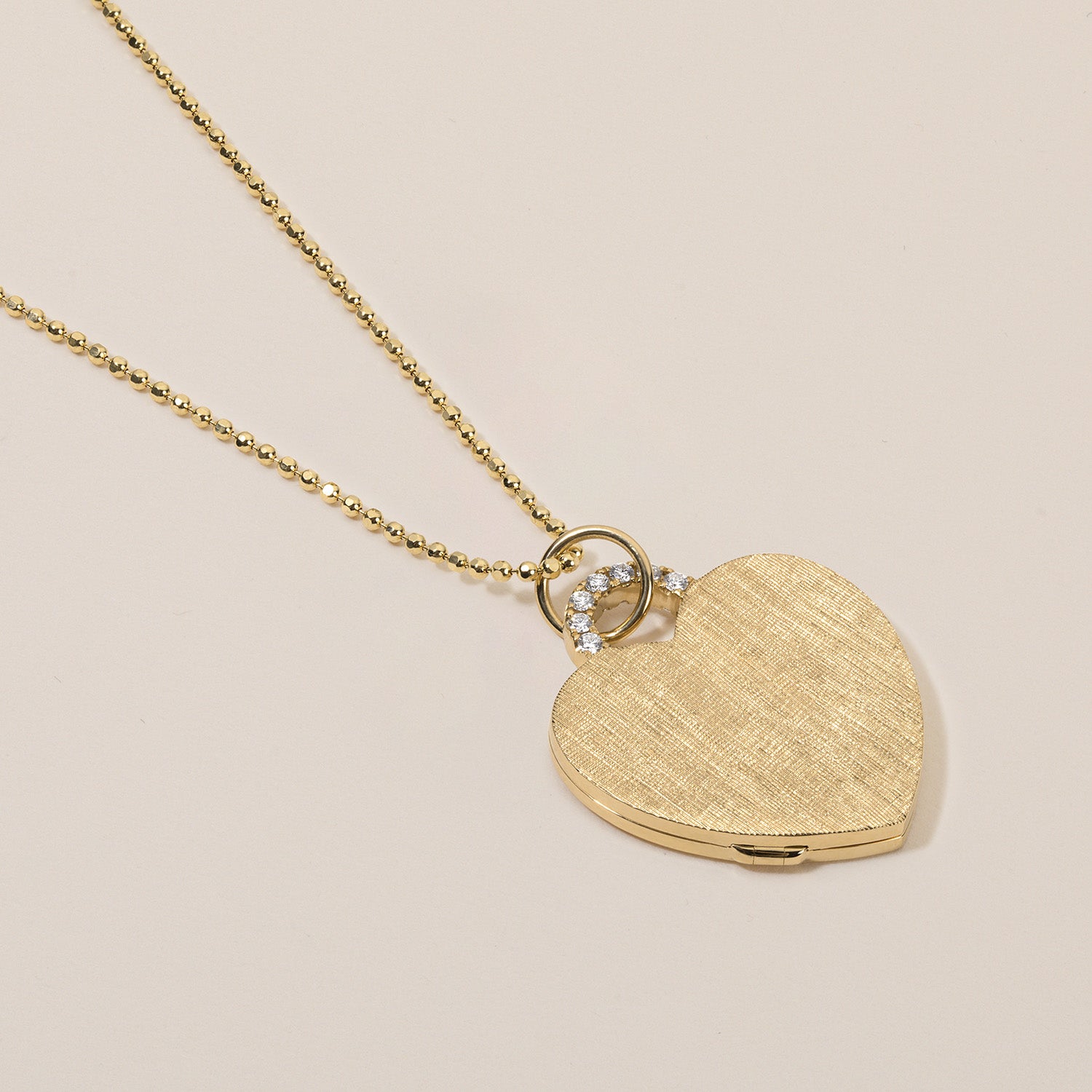 18k gold heart locket necklace with diamond arch