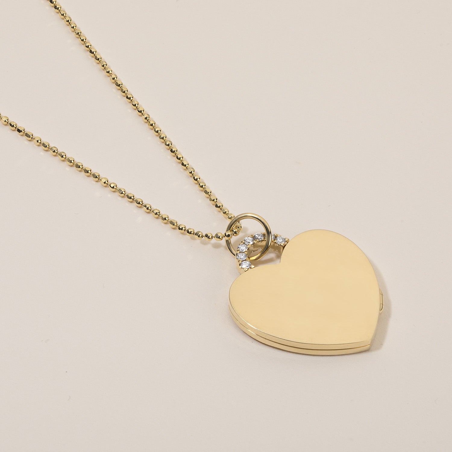 18k gold heart locket necklace with diamond arch