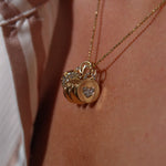 diamond pavé heart locket necklace in 18k gold
