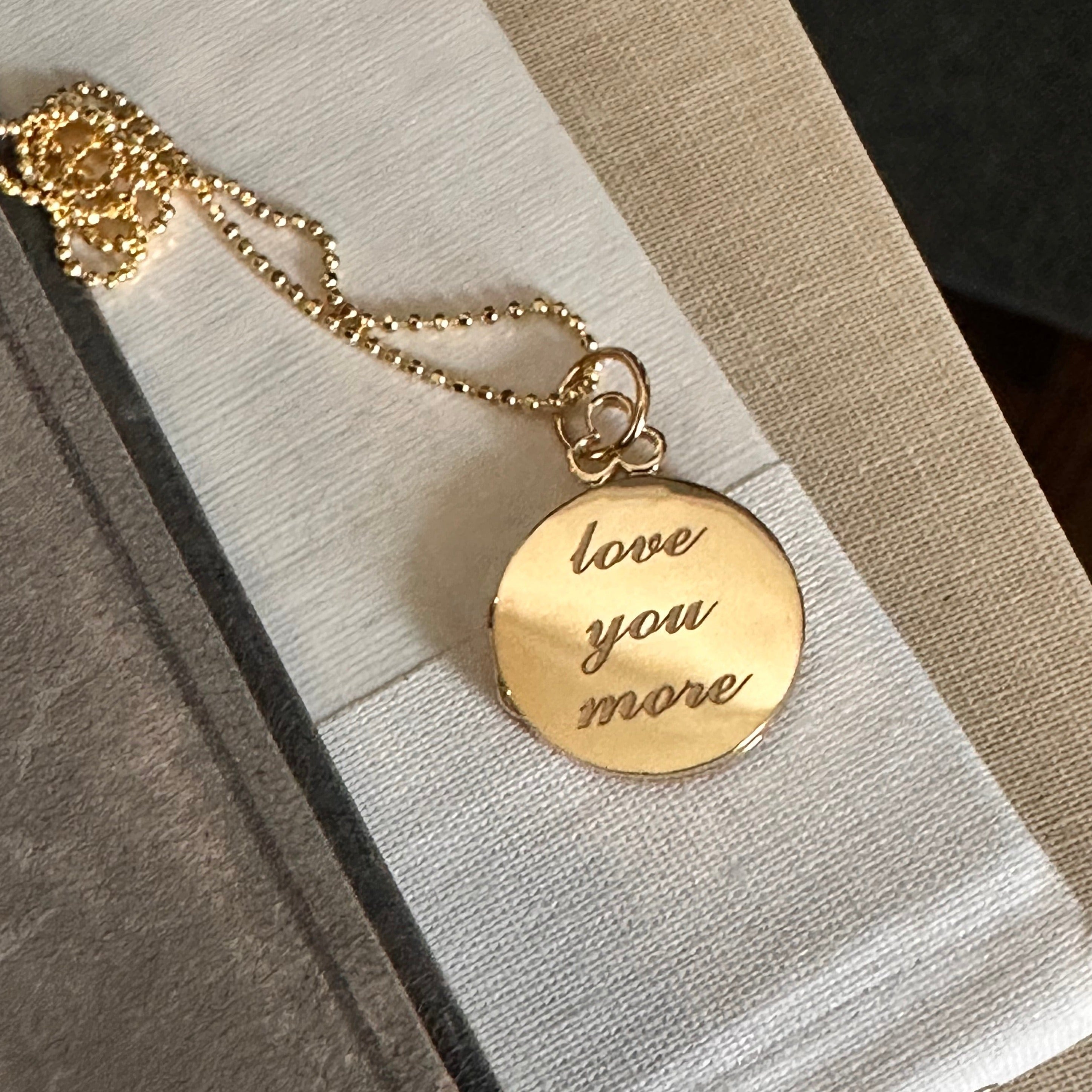 18k gold round classic locket with engraving