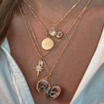north star locket necklace in 18k gold with diamond 