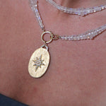 pearl north star oval locket necklace with diamond arch in florentine finish
