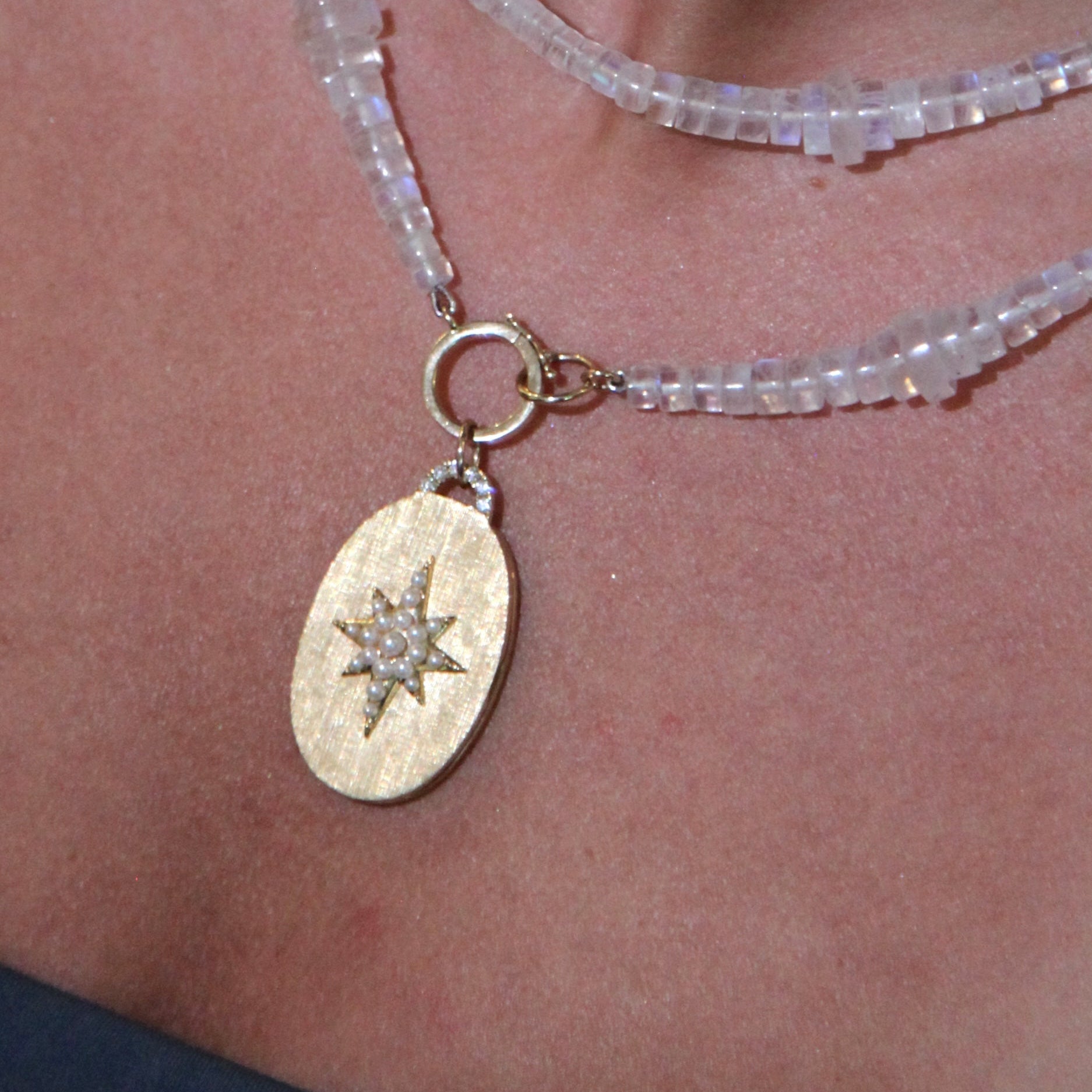 pearl north star oval locket necklace with diamond arch in florentine finish
