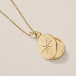 north star locket necklace in 18k gold with diamond 