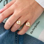 Heart ring in solid gold with a pink sapphire pavé heart design
