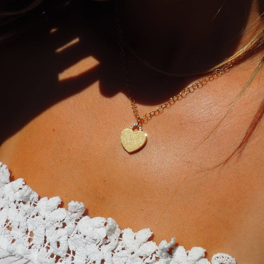 18k gold heart locket necklace with diamond arch