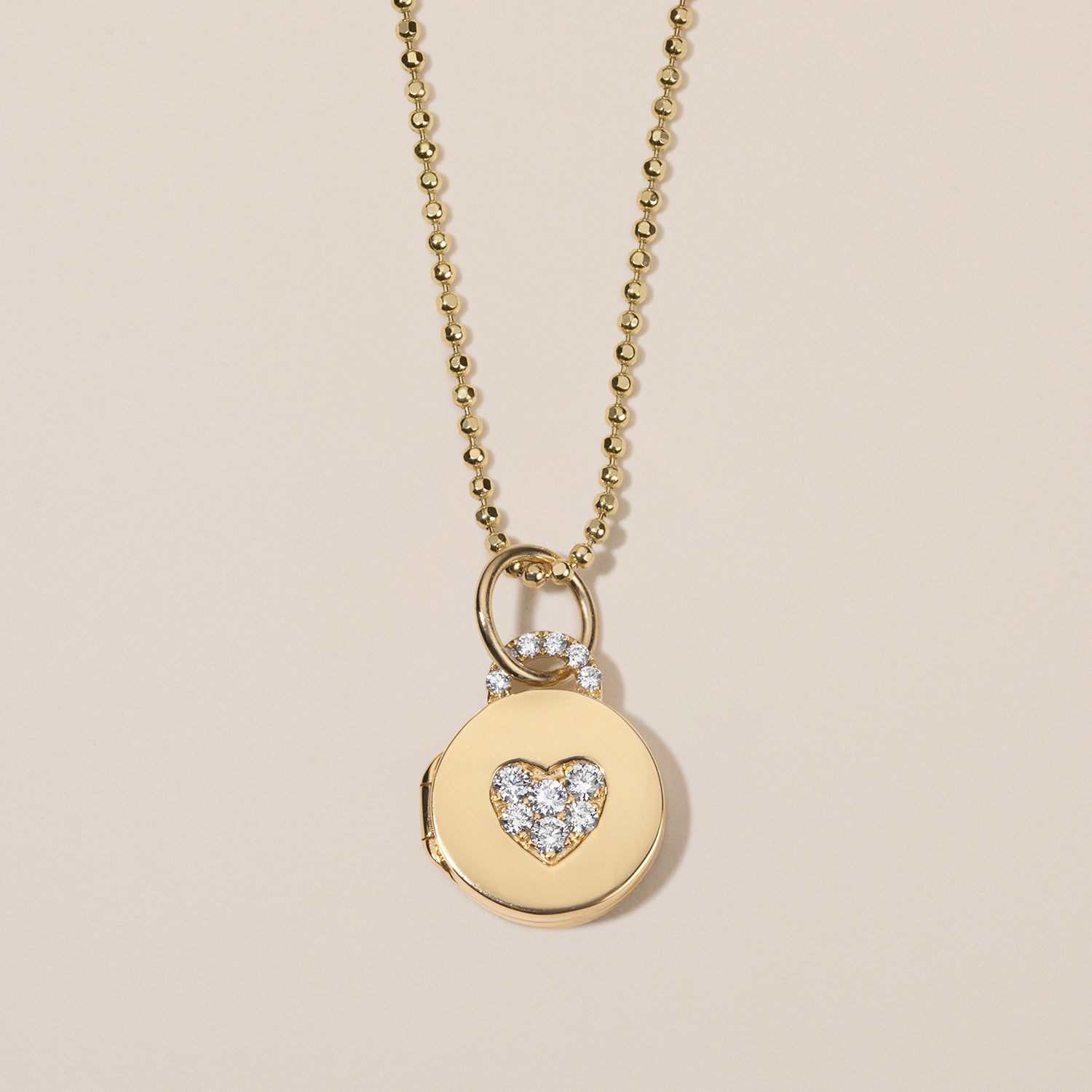 diamond pavé heart locket necklace in 18k gold
