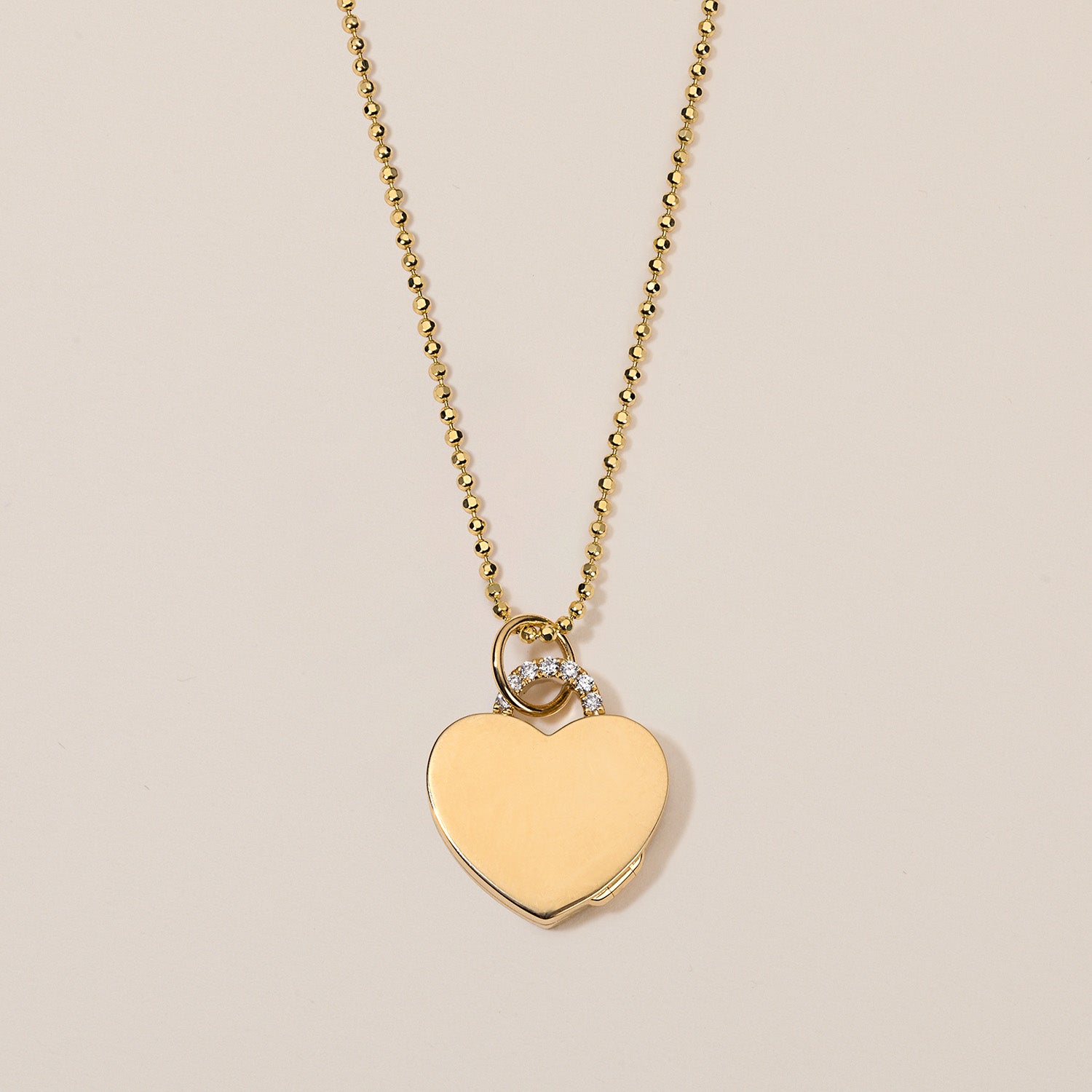 18k gold heart locket necklace with diamond arch