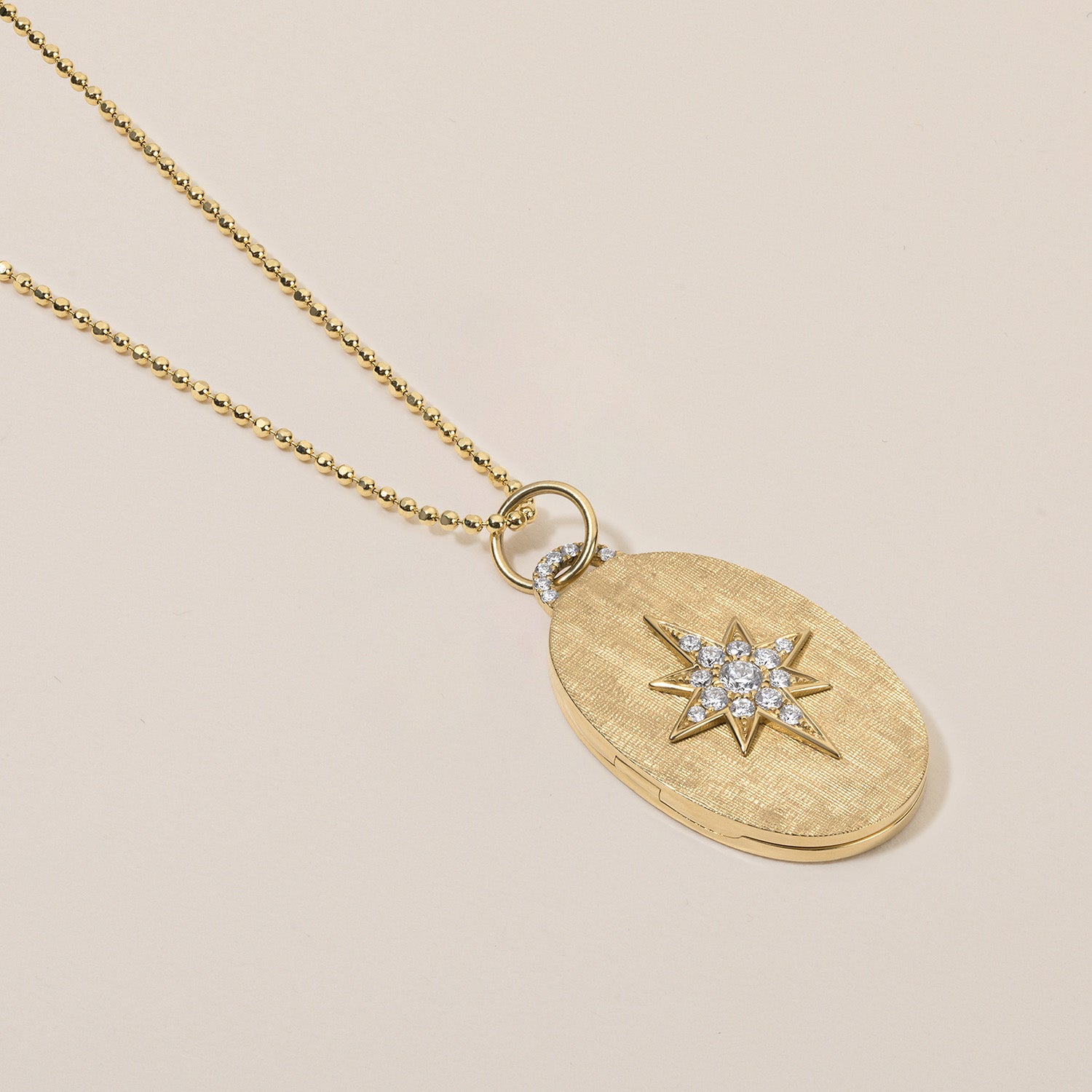 diamond north star oval locket necklace in 18k gold