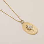 pearl north star oval locket necklace with diamond arch in florentine finish
