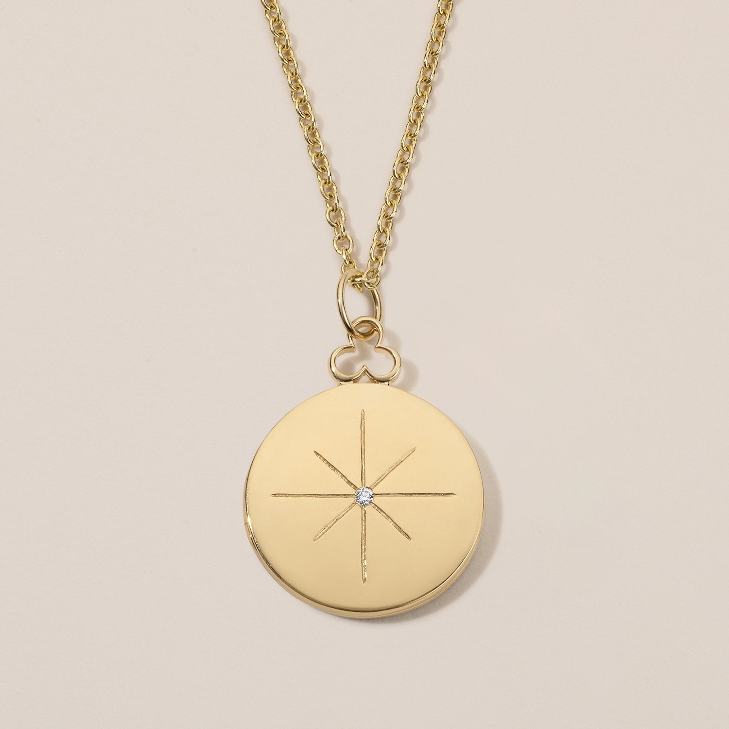18k north star locket necklace in 18k gold with diamond 